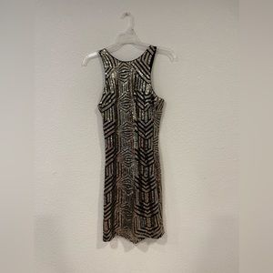 Lulu’s black and gold sequin mini dress. Size Small